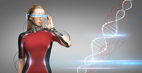 Image showing woman with futuristic glasses and sensors