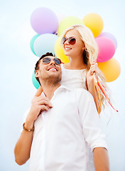 Image showing couple with colorful balloons