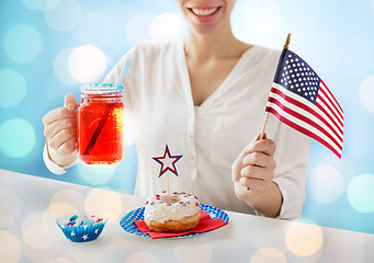 Image showing happy woman celebrating american independence day