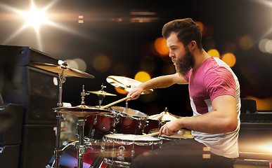 Image showing male musician playing cymbals at music concert