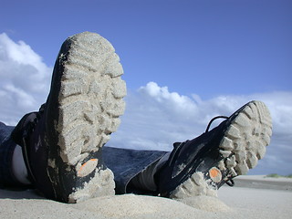 Image showing shoes on mud