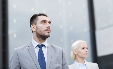 Image showing close up of serious businessmen