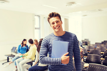 Image showing group of smiling students in lecture hall