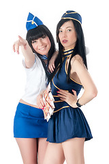 Image showing Two pretty stewardess with money