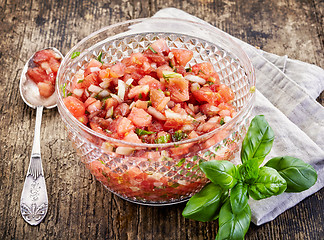 Image showing chopped tomatoes with onions and basil