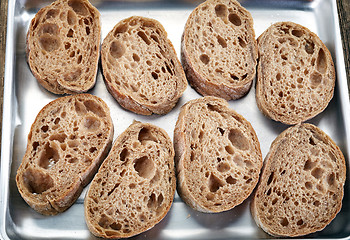 Image showing bread slices on pan