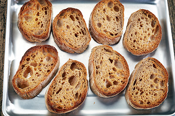 Image showing bread slices on pan