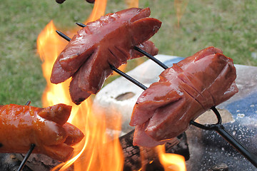 Image showing bratwurst preparing on the fire