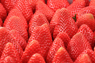 Image showing red strawberries texture as background