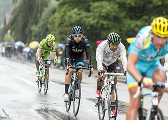 Image showing Group of Cyclists Riding in the Rain - Tour de France 2014