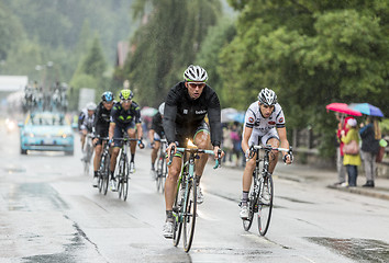 Image showing The Peloton Riding in the Rain - Tour de France 2014