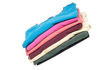 Image showing A pile of folded T shirts