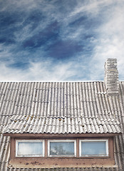 Image showing old house with a tiled roof and chimney