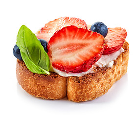 Image showing toasted bread slice with cream cheese and strawberries