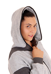 Image showing Pretty girl in gray hoodie in profile.