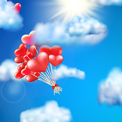 Image showing Heart-shaped baloon in the sky. EPS 10