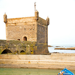 Image showing   boat and sea in africa morocco old castle brown brick  sky