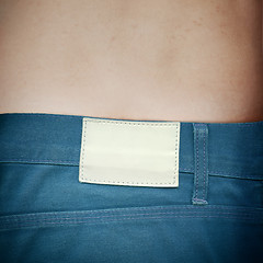 Image showing Blank leather label on jeans