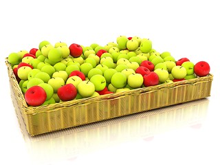 Image showing Wicker basket full of apples isolated on white