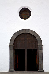 Image showing  lanzarote  spain canarias     closed wood  church door and whit