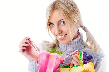 Image showing Pretty smiling girl with shopping bags