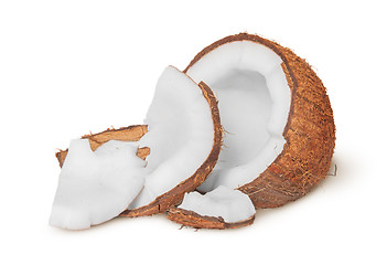 Image showing Half coconut with a few pieces of pulp