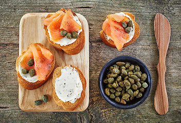 Image showing toasted bread slices with cream cheese and smoked salmon