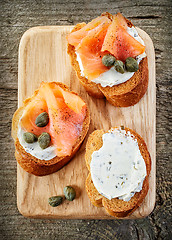 Image showing toasted bread slices with cream cheese and smoked salmon