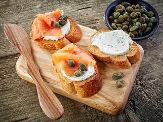 Image showing toasted bread slices with cream cheese and smoked salmon