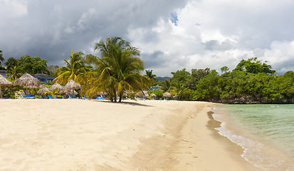 Image showing Beach on tropical island. Clear blue water and sky 