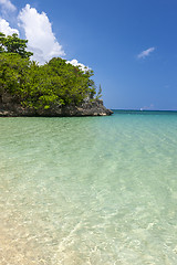 Image showing Beach on tropical island. Clear blue water and sky 