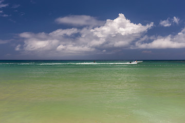 Image showing Beach on tropical island. Clear blue water and sky 