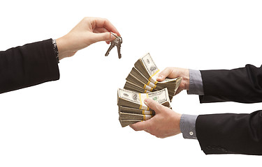 Image showing Handing Over Thousands of Dollars for House Keys on White