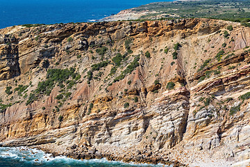 Image showing Rocky Beach and Sandstone Cliffs