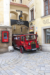Image showing BRATISLAVA, SLOVAKIA - MAY 07 2013: Tourists in a bus on the streets in Old Town 