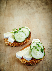 Image showing toasted bread with brie and cucumber