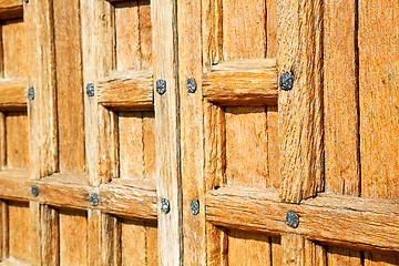 Image showing door in italy   wood and t  texture nail