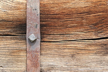 Image showing metallic mount on oak beam