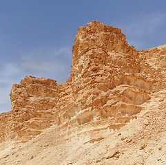 Image showing Scenic weathered orange  rocks in stone desert