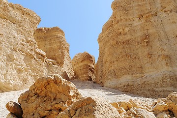 Image showing Scenic weathered orange  rocks in stone desert