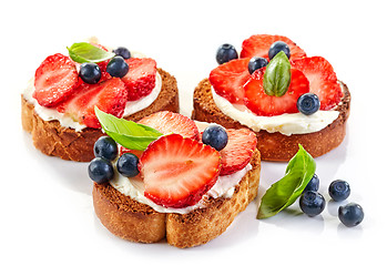 Image showing toasted bread with cream cheese and berries
