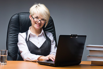 Image showing Attractive businesswoman with laptop