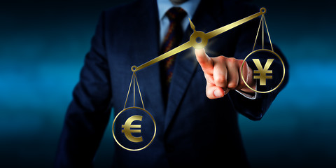 Image showing Euro Sign Outweighing The Yuan On A Golden Scale