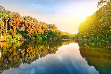 Image showing Pink sunrise over river