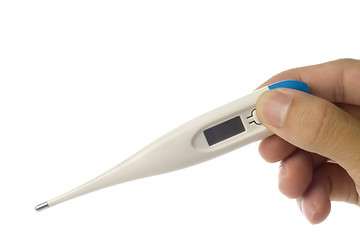 Image showing Hand holding a digital thermometer

