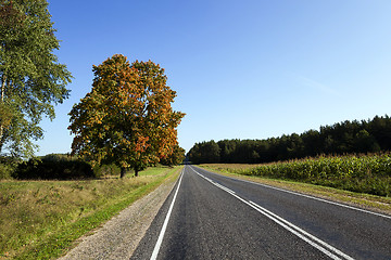 Image showing passing an empty asphalt road  