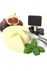 Image showing Piece of cheese with blackboard