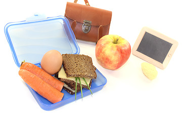 Image showing sandwich eaten during recess with cheese and carrots