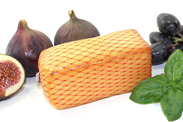 Image showing Piece of cheese with figs