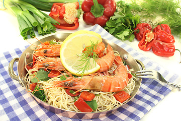 Image showing Shrimp with mie noodles and lemon